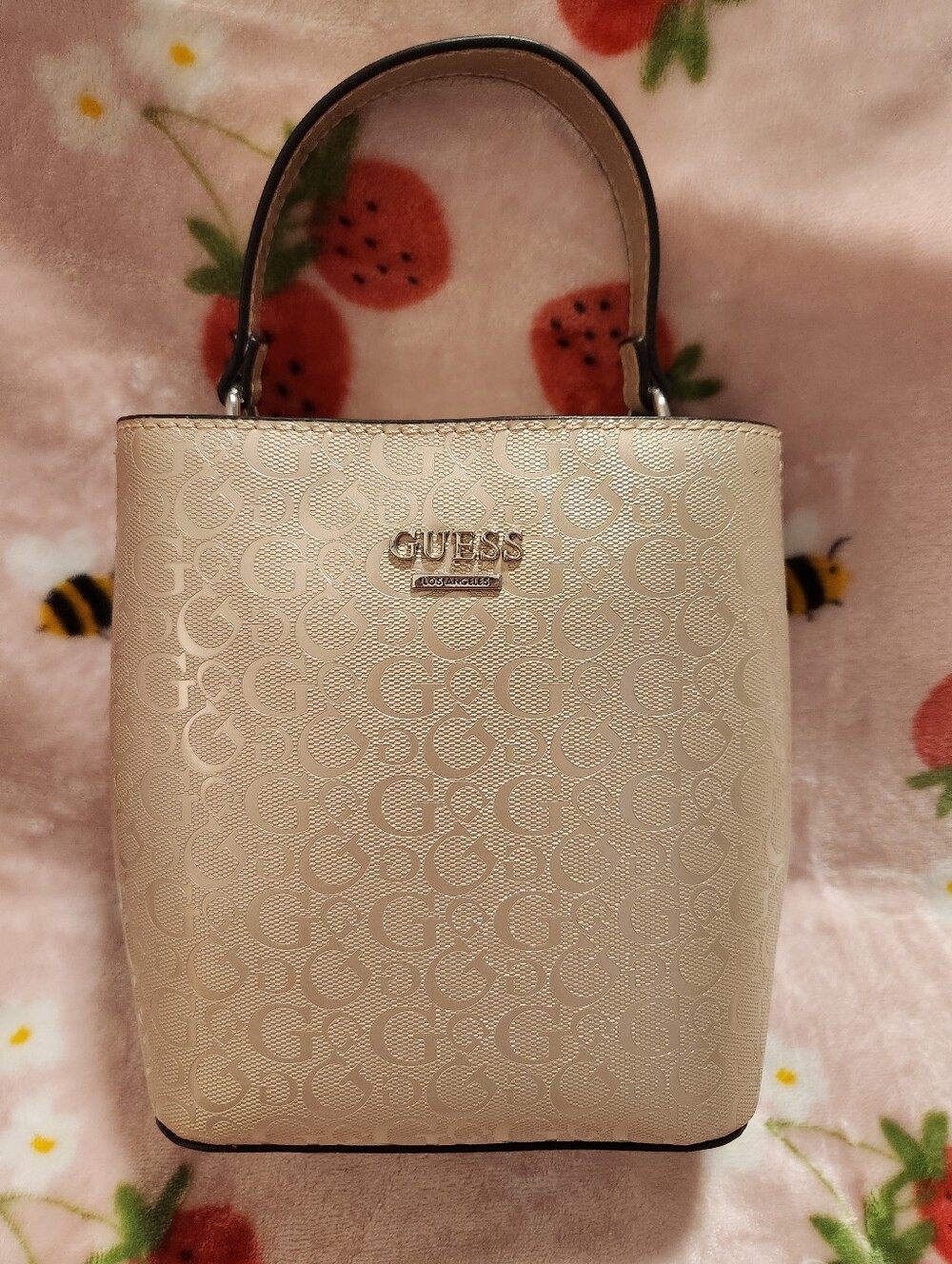 GUESS Champagne Embossed Monogram Bucket Bag